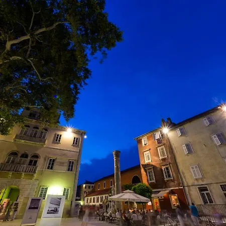 Caesar By Belmont Realty *